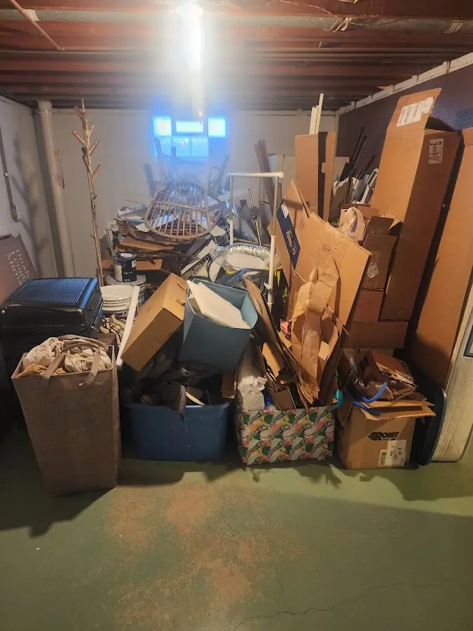 Roll-off dumpster container at job site for 6 Yard Dumpster Rental in Medford